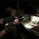 DELI LED Flashlight 1000 lm Black/Gold with 5000mAh Rechargeable Battery (Model DL551052 / EDL551052)
